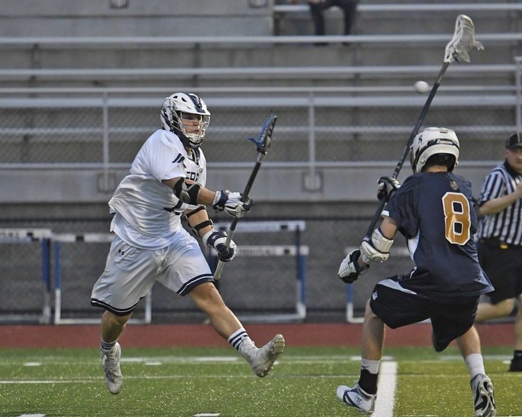 Prep lax squad handles MC, climbs over .500